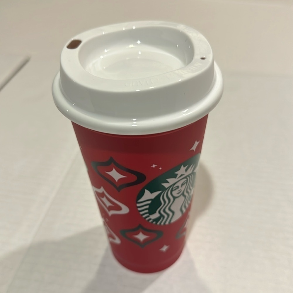 NWOT Starbucks 2023 reusable cup with red green & white colors good for refills